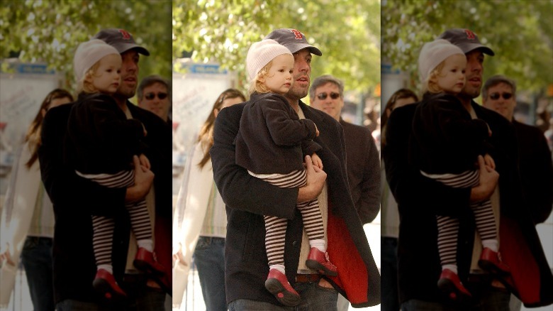 Ben Affleck holding young Violet around town