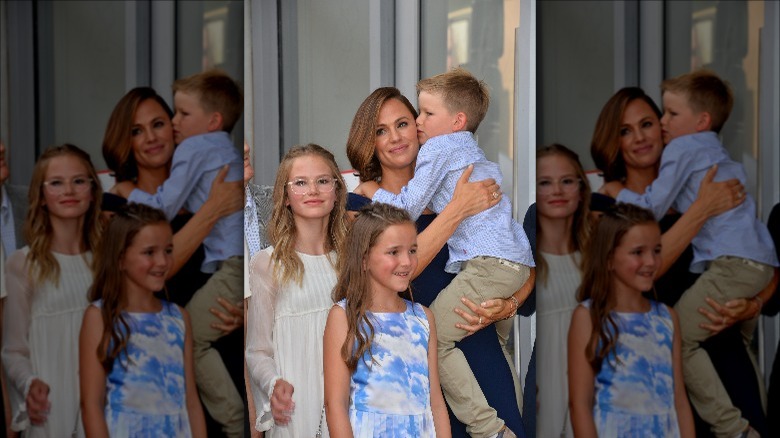 Jennifer Garner smiles with her three children