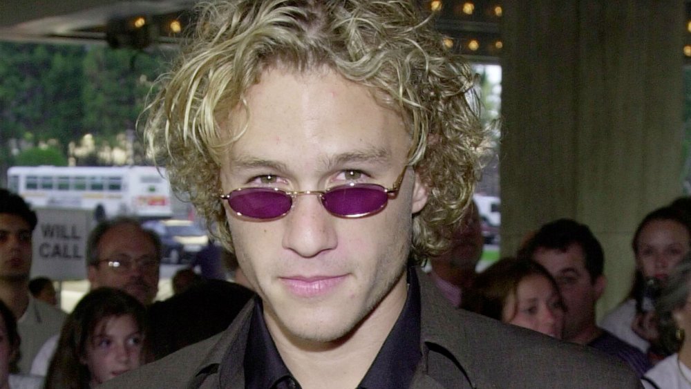 Heath Ledger with tiny purple sunglasses