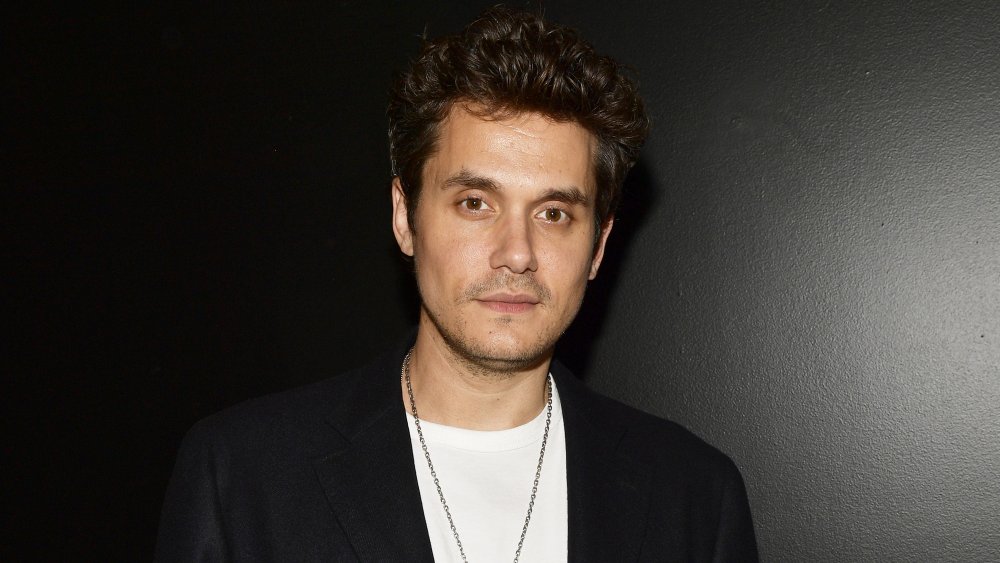 John Mayer in black blazer and white tshirt