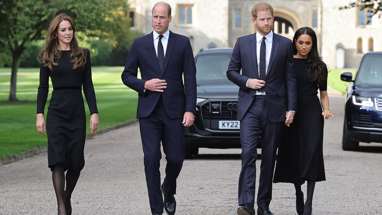 Kate Middleton, Prince William, Prince Harry, and Meghan Markle walking