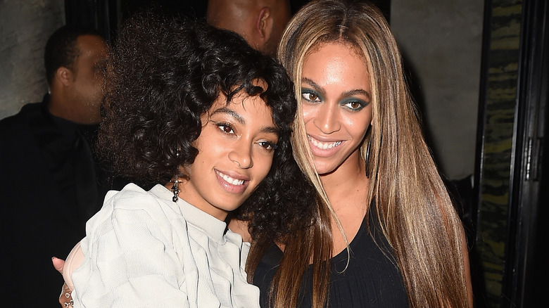 Beyonce and Solange smiling