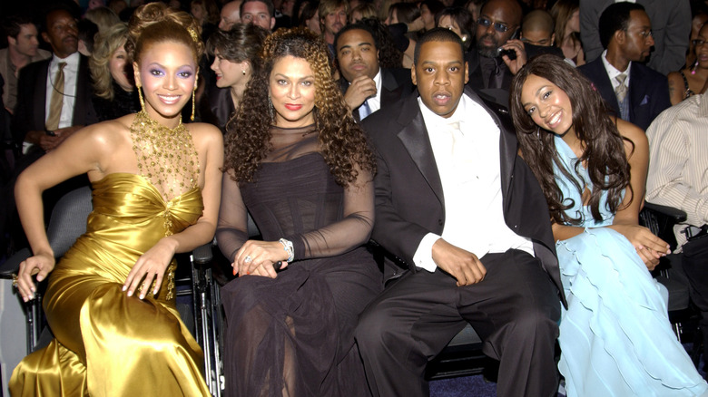 Beyoncé, Tina Knowles, Jay-Z and Solange sitting