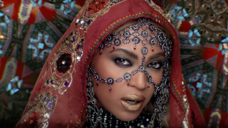 Beyonce posing in traditional Indian attire