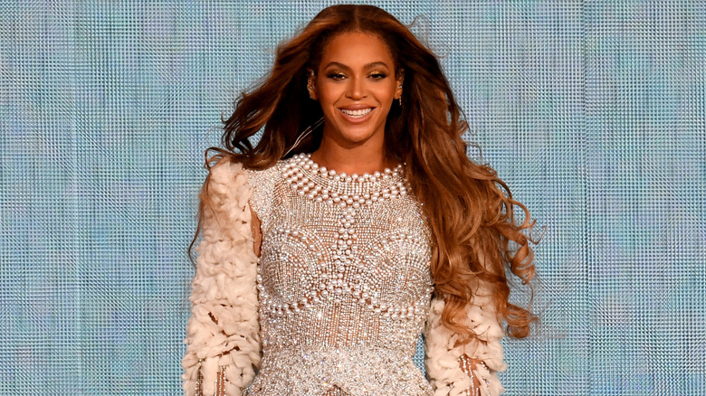 Beyoncé walking and smiling on stage