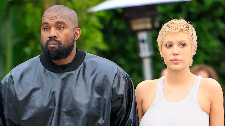 Kanye West, Bianca Censori shoulder-to-shoulder outdoors