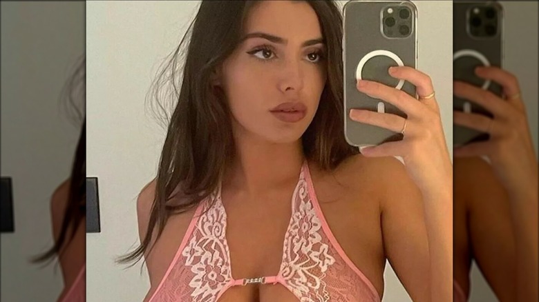Bianca Censori taking mirror selfie