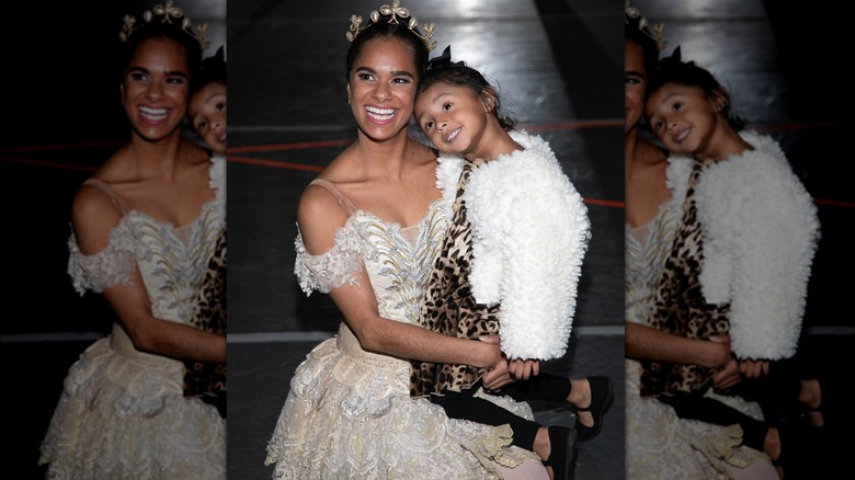 Misty Copeland holding Bianka Bryant