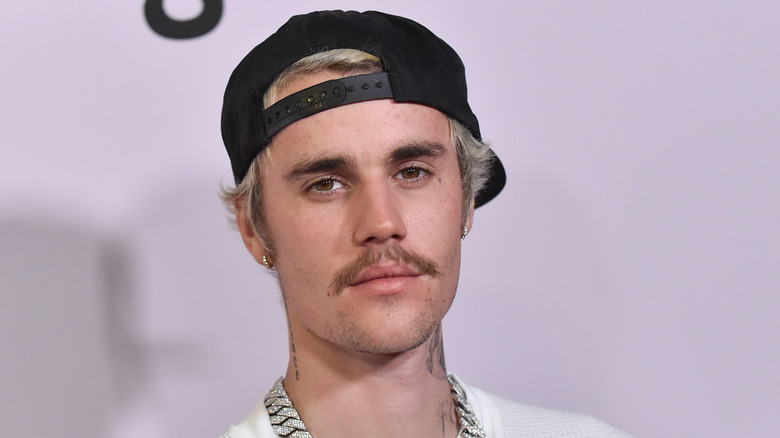 Justin Bieber posing at an event