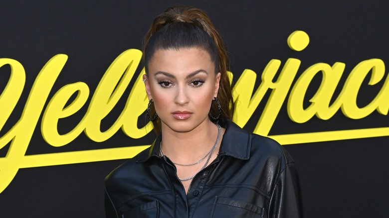 Tori Kelly posing at an event