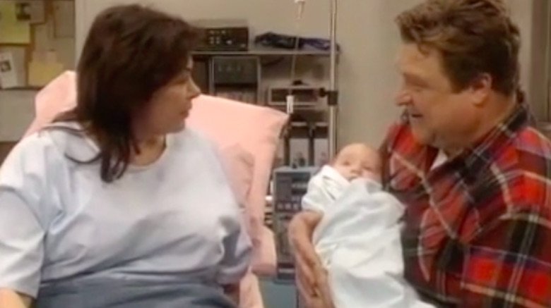 Roseanne and Dan with baby Jerry Garcia