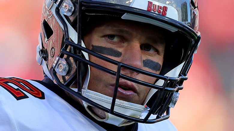 Tom Brady wearing football helmet