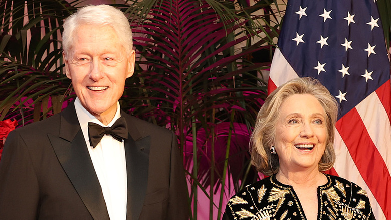 Hillary and Bill Clinton smiling