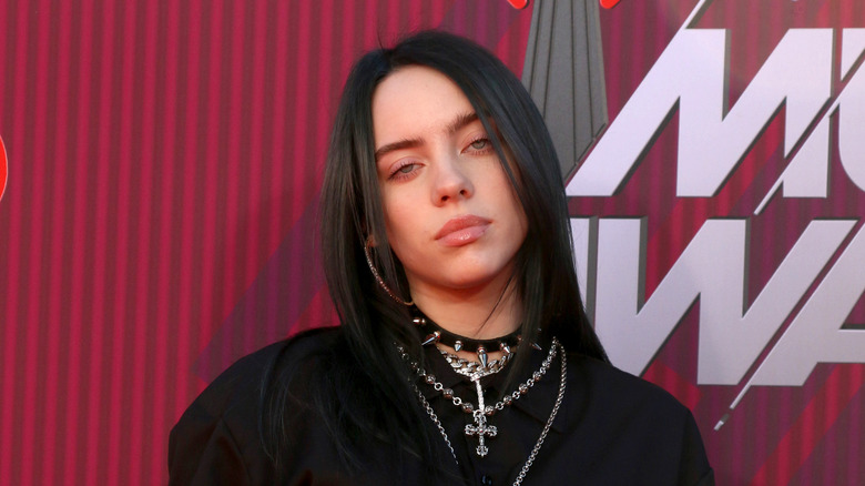 Billie Eilish posing on the red carpet 