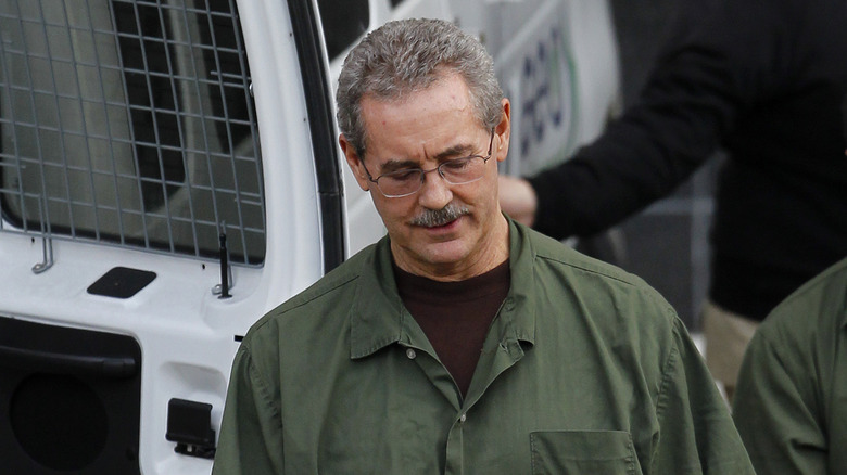 Allen Stanford green jumpsuit