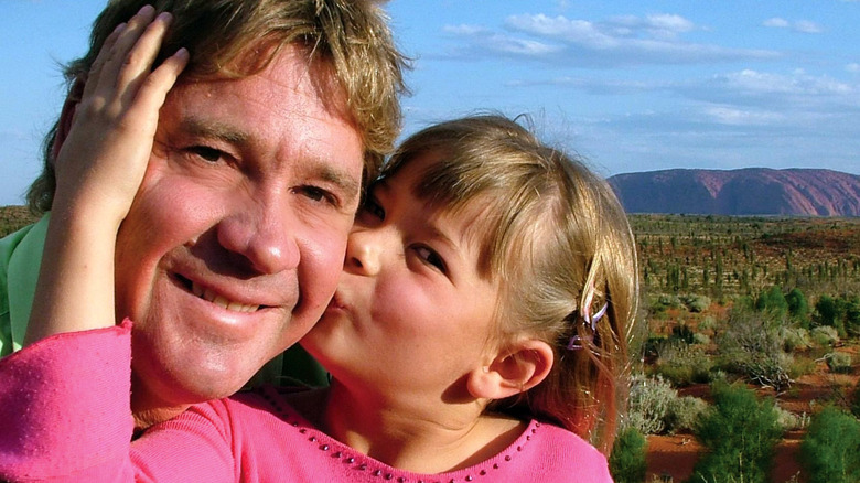 Bindi Irwin kissing Steve Irwin's cheek