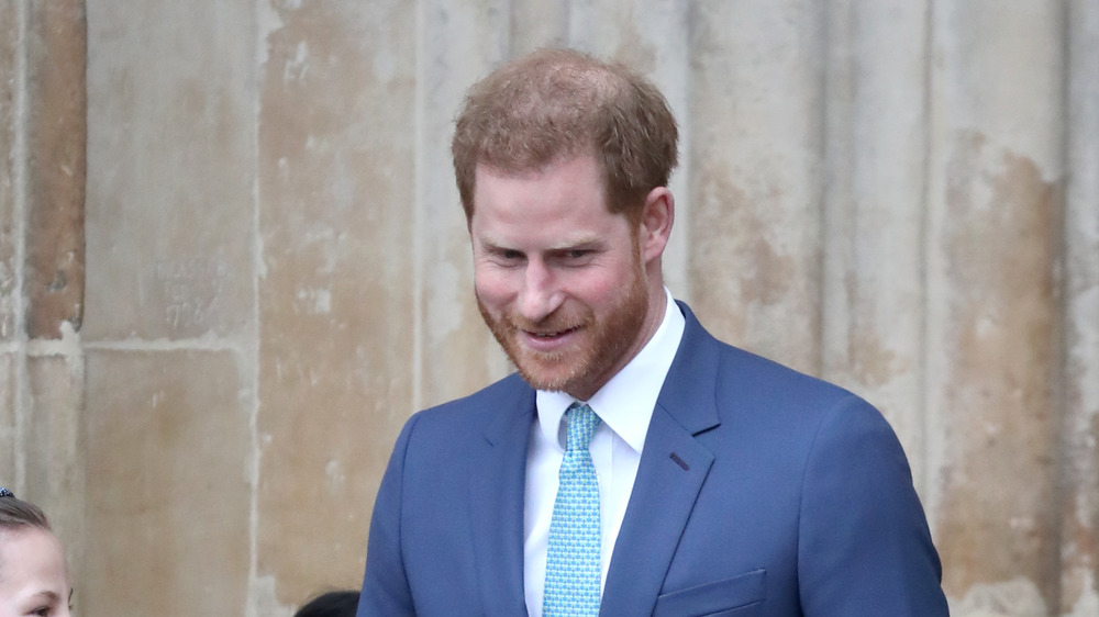 Prince Harry looking down