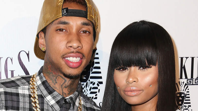 blac chyna and tyga at a grand opening 