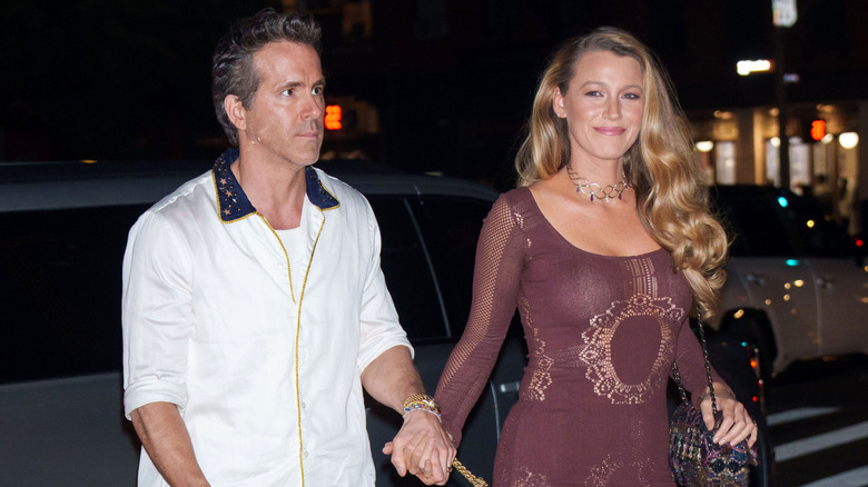 Ryan Reynolds and Blake Lively holding hands