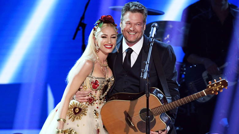 Blake Shelton and Gwen Stefani smiling