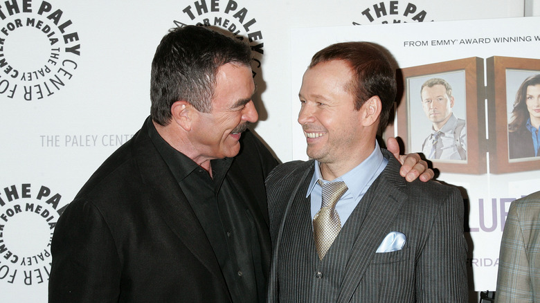 Tom Selleck and Donnie Wahlberg laughing