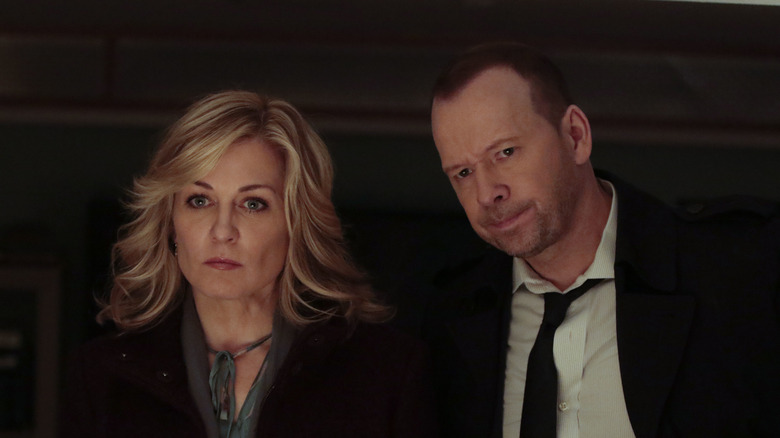 Amy Carlson and Donnie Wahlberg serious look