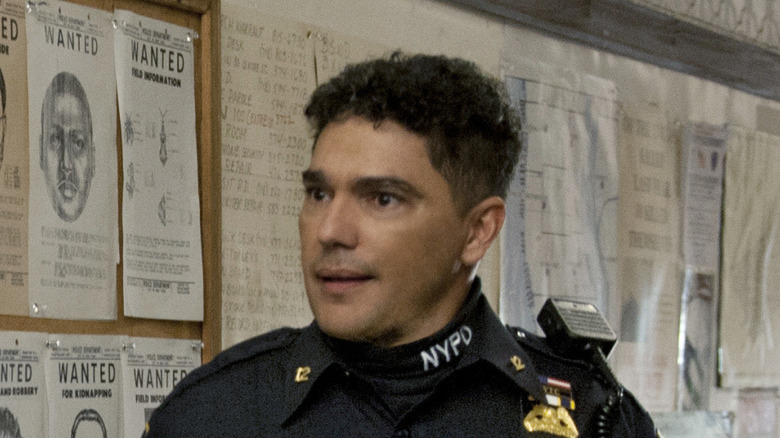 Nick Turturro as a police officer