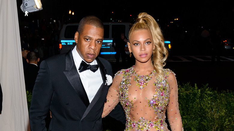 Jay-Z and Beyonce posing