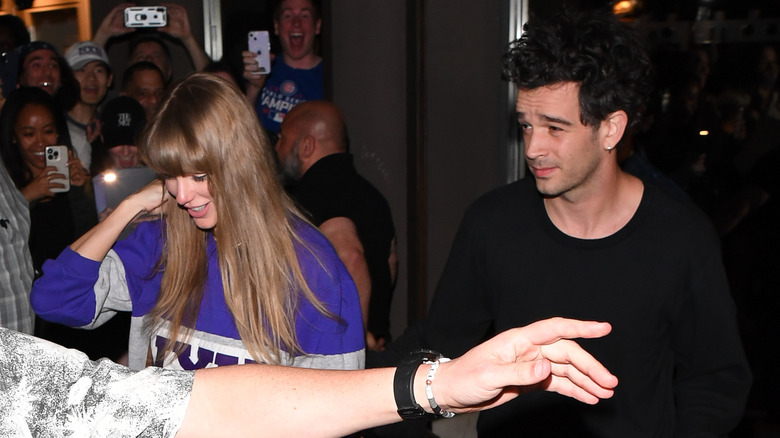 Taylor Swift and Matt Healy walking