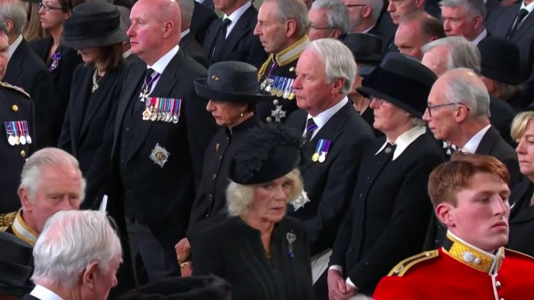 Camilla Parker Bowles looking to the side at Queen Elizabeth's funeral