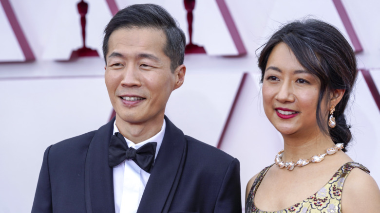 Lee Isaac Chung and Valerie Chung pose at the 93rd Annual Academy Awards