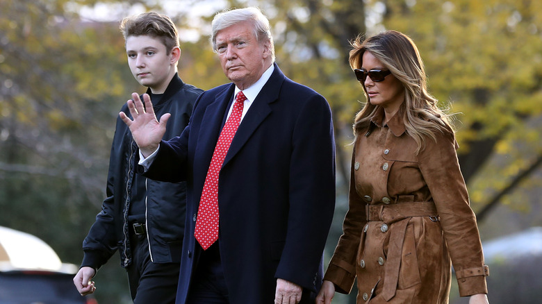 Barron, Donald, and Melania Trump walking