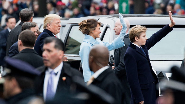 Melania and Barron Trump waving