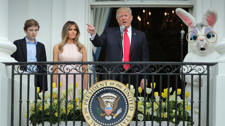 Barron Trump, his parents, and Easter Bunny on balcony