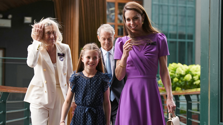 Kate Middleton walking beside Princess Charlotte