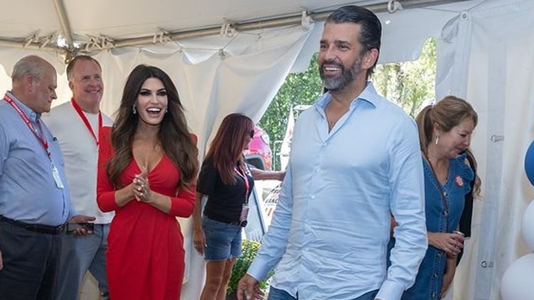 Kimberly Guilfoyle and Donald Trump Jr smiling