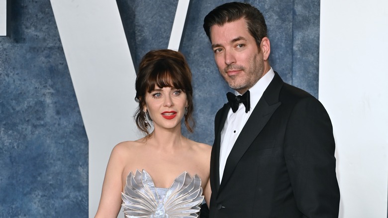 Zooey Deschanel and Jonathan Scott on the red carpet