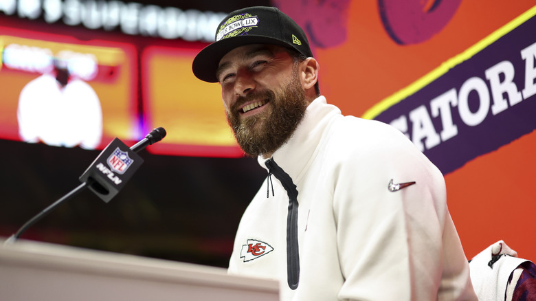 Travis Kelce speaking during a press conference