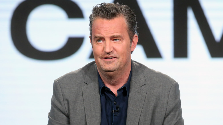 Matthew Perry speaking on stage