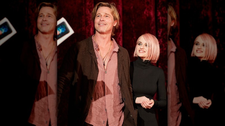 Brad Pitt and Joey King attend a "Bullet Train" red carpet event