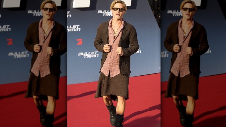 Brad Pitt wearing skirt on the red carpet