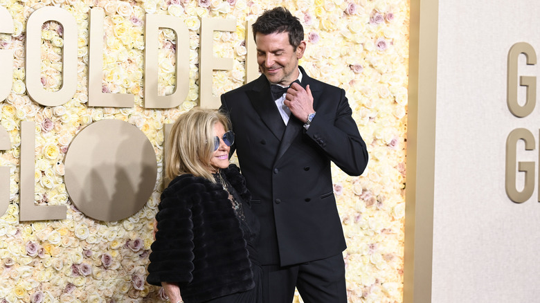 Bradley Cooper posing with his mom