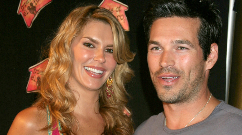 Brandi Glanville smiling with Eddie Cibrian