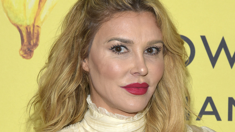 Brandi Glanville stern, red lipstick