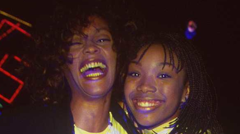 Brandy Norwood and Whitney Houston laughing together