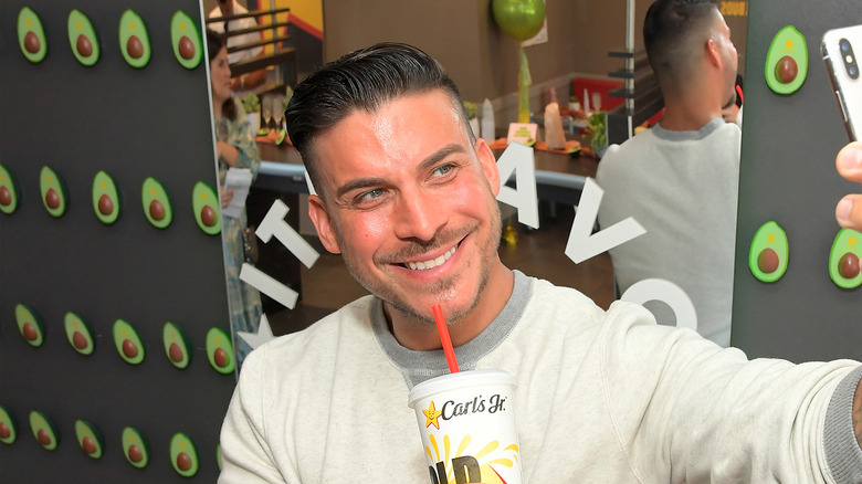 Jax Taylor smiling and taking a selfie