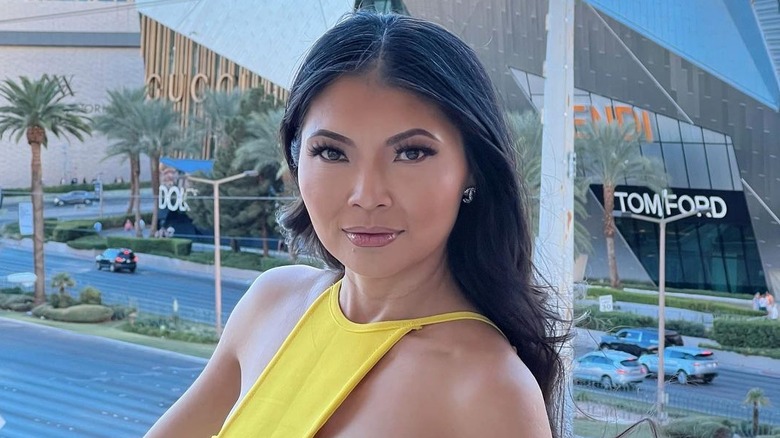 Jennie Nguyen posing on a balcony in Las Vegas