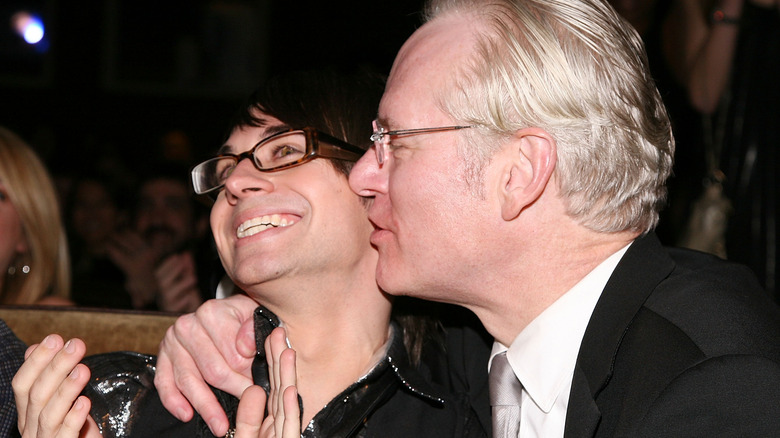 Tim Gunn kissing Christian Siriano's cheek