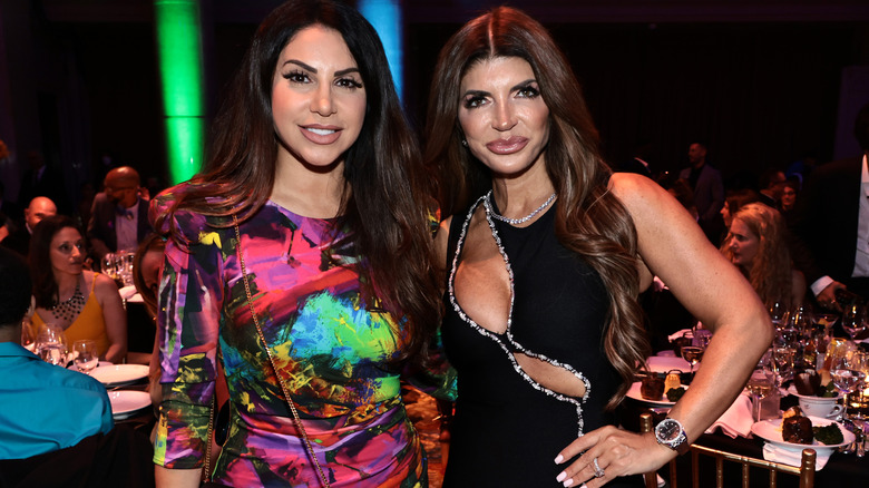 Jenifer Aydin smiling next to Teresa Giudice