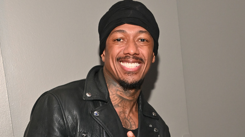 Nick Cannon, smiling